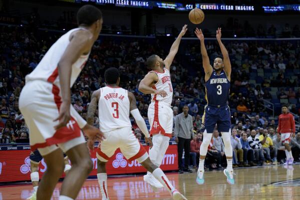 McCollum leads short handed Pelicans past Rockets 119 108 AP News